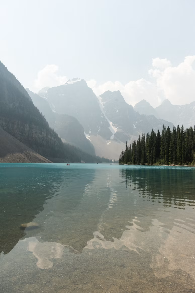 Misty lake among mountains